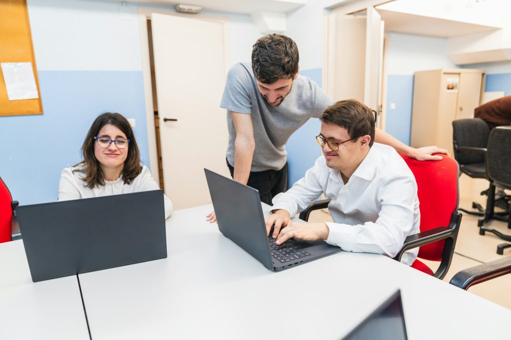 Interactive Computer Lesson with Teacher and Down Syndrome Student